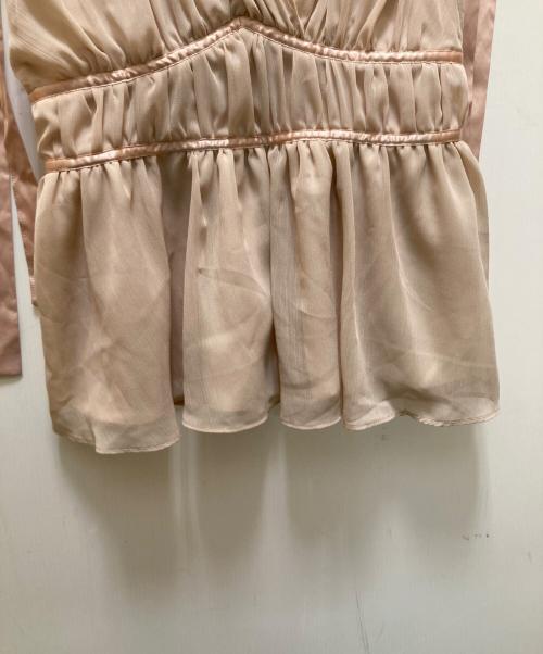 polaura（ポロ―ラ）polaura (ポロ―ラ) ショルダーリボンシフォンブラウス ベージュ サイズ:freeの古着・服飾アイテム
