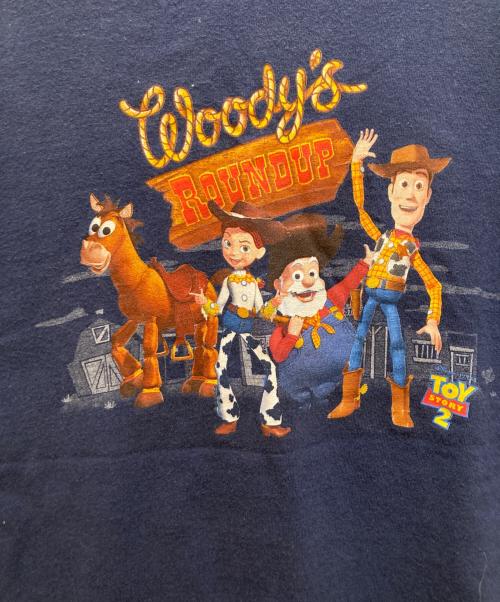 THE Disney Store（ザ ディズニー ストア）THE Disney Store (ザ ディズニー ストア) ムービープリントTシャツ ブルー サイズ:mの古着・服飾アイテム
