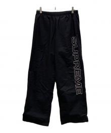 SUPREME（シュプリーム）の古着「スペルアウト・エンブロイダード・リップストップ・トラックパンツ」｜ブラック