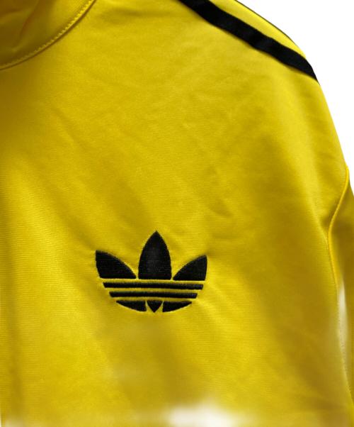 adidas（アディダス）adidas (アディダス) アディカラー クラシック ファイヤーバード ルーズ トラックトップ イエロー サイズ:XSの古着・服飾アイテム