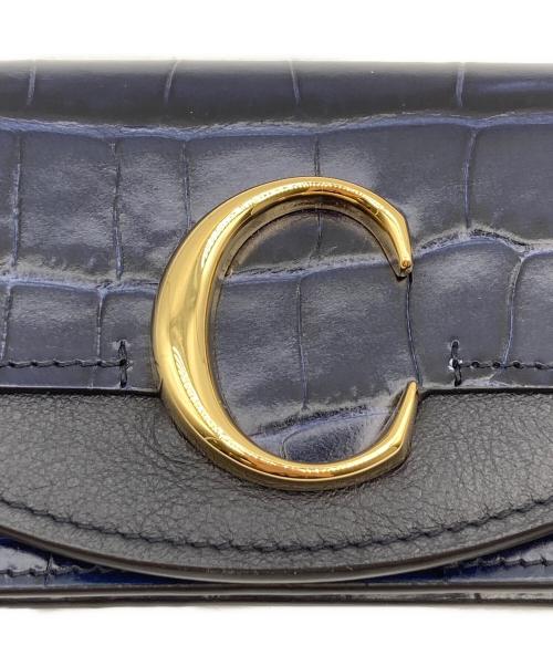 Chloe（クロエ）Chloe (クロエ) 型押し2つ折りパスケース ネイビーの古着・服飾アイテム