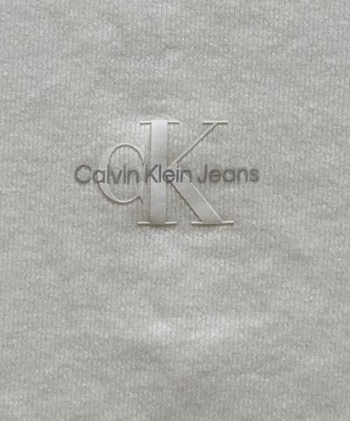 Calvin Klein Jeans（カルバンクラインジーンズ）Calvin Klein Jeans (カルバンクラインジーンズ) モノグラムベビーTシャツ ホワイト サイズ:Mの古着・服飾アイテム