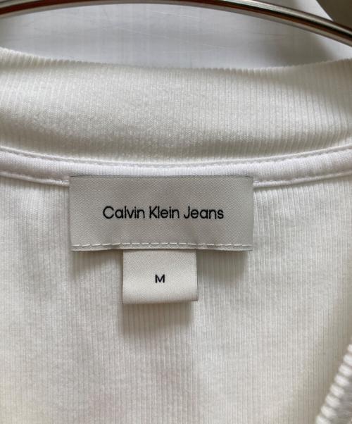 Calvin Klein Jeans（カルバンクラインジーンズ）Calvin Klein Jeans (カルバンクラインジーンズ) モノグラムベビーTシャツ ホワイト サイズ:Mの古着・服飾アイテム