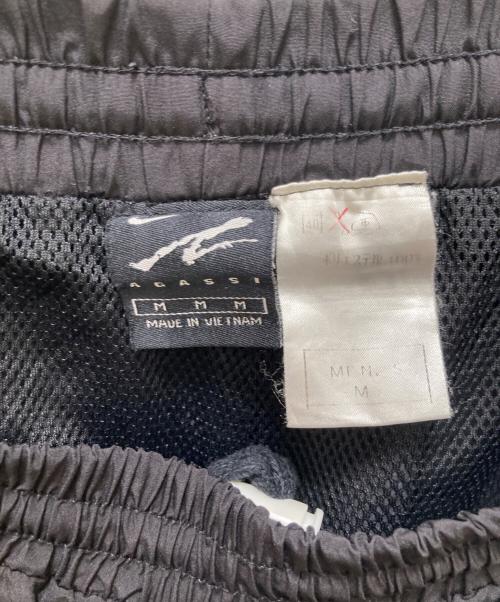 NIKE（ナイキ）NIKE (ナイキ) agassi コラボトラックパンツ ブラック サイズ:Mの古着・服飾アイテム