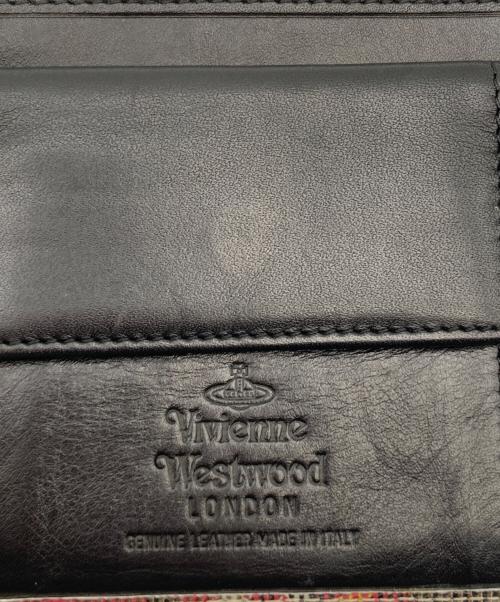 Vivienne Westwood（ヴィヴィアンウエストウッド）Vivienne Westwood (ヴィヴィアンウエストウッド) タータンチェック2つ折り財布 ベージュ×レッドの古着・服飾アイテム