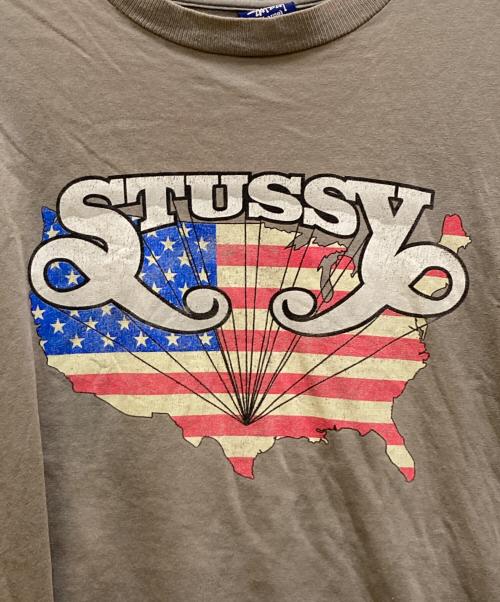 stussy（ステューシー）stussy (ステューシー) 90s 星条旗プリントTシャツ グレー サイズ:XLの古着・服飾アイテム
