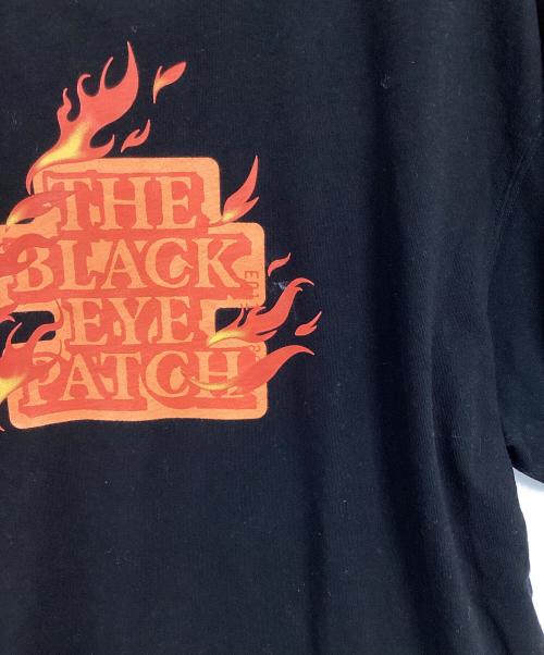 THE BLACK EYE PATCH（ブラックアイパッチ）THE BLACK EYE PATCH (ブラックアイパッチ) ファイヤーセンターロゴTシャツ ブラック サイズ:XLの古着・服飾アイテム