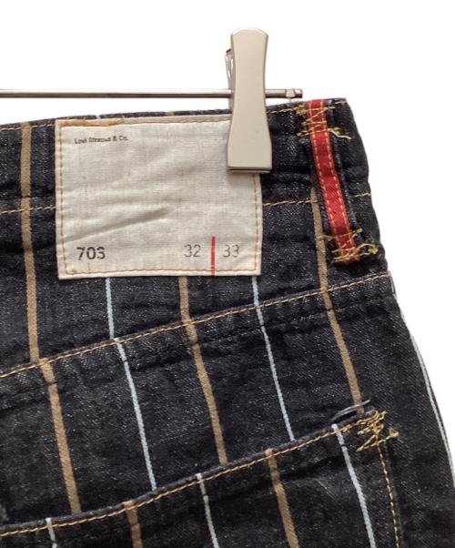 LEVI'S（リーバイス）LEVI'S (リーバイス) 703ストライプイージーパンツ インディゴ サイズ:32の古着・服飾アイテム