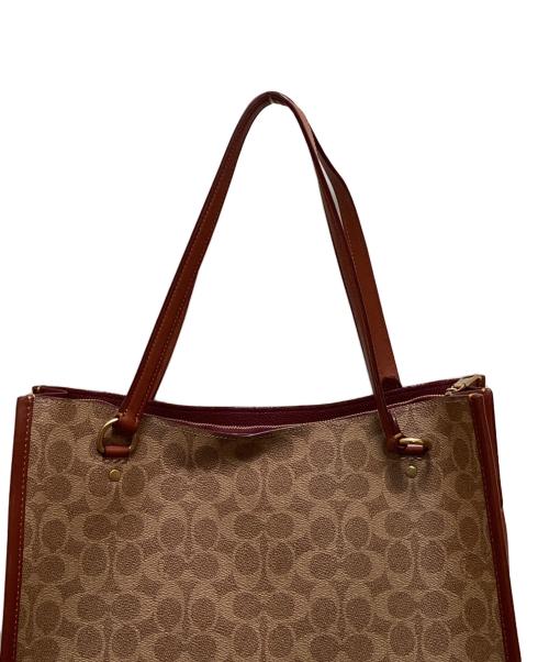 COACH（コーチ）COACH (コーチ) タイラー キャリーオール シグネチャー キャンバス 2WAYバッグ ベージュの古着・服飾アイテム