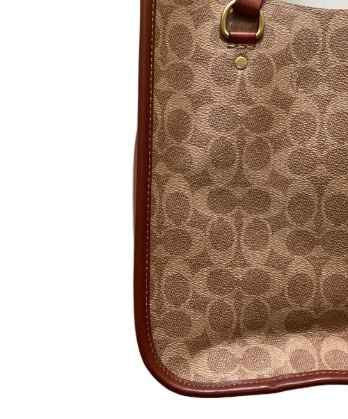 COACH（コーチ）COACH (コーチ) タイラー キャリーオール シグネチャー キャンバス 2WAYバッグ ベージュの古着・服飾アイテム