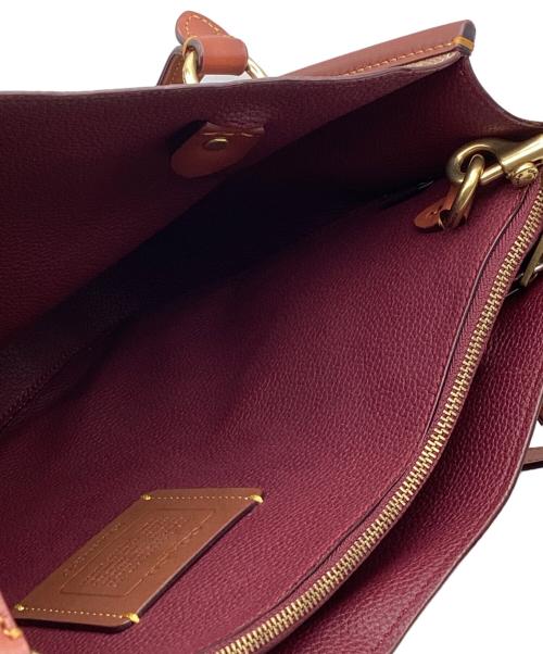 COACH（コーチ）COACH (コーチ) タイラー キャリーオール シグネチャー キャンバス 2WAYバッグ ベージュの古着・服飾アイテム