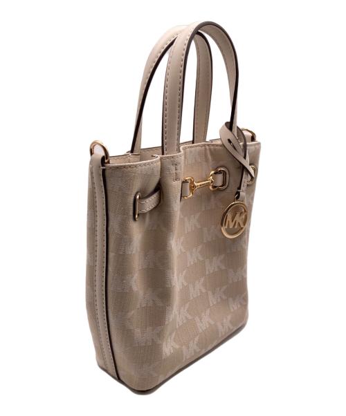 MICHAEL KORS（マイケルコース）MICHAEL KORS (マイケルコース) CARSON NS クロスボディ スモール - MKシグネチャー ホワイトの古着・服飾アイテム