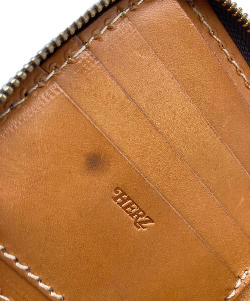 Herz（ヘルツ）Herz (ヘルツ) ラウンドファスナー2つ折り財布 ブラウンの古着・服飾アイテム