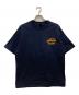 AVIREX（アヴィレックス）の古着「SAGARA TOM CAT Tシャツ」｜ネイビー