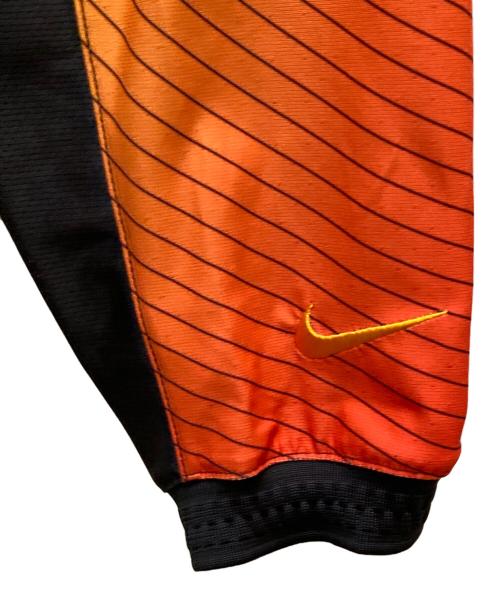 NIKE（ナイキ）NIKE (ナイキ) KOI (コイ) コラボゴールキーパー風ジャージーカットソー グリーン×オレンジ サイズ:Ｍの古着・服飾アイテム