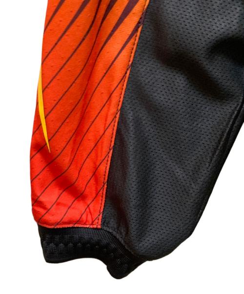 NIKE（ナイキ）NIKE (ナイキ) KOI (コイ) コラボゴールキーパー風ジャージーカットソー グリーン×オレンジ サイズ:Ｍの古着・服飾アイテム