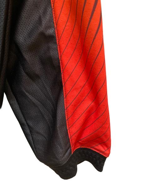 NIKE（ナイキ）NIKE (ナイキ) KOI (コイ) コラボゴールキーパー風ジャージーカットソー グリーン×オレンジ サイズ:Ｍの古着・服飾アイテム
