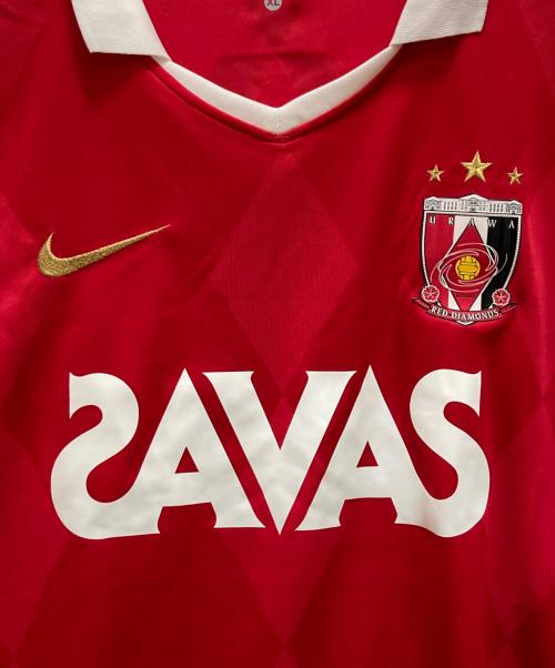 NIKE（ナイキ）NIKE (ナイキ) 浦和レッズ 2010 ユニフォーム ホーム 長袖 レッド サイズ:ｘｌ 未使用品の古着・服飾アイテム