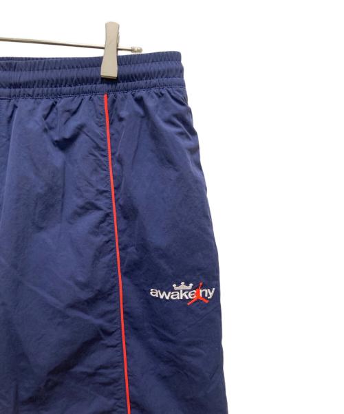 JORDAN（ジョーダン）JORDAN (ジョーダン) AWAKE (アウェイク) ニューヨーク トラック パンツ ブルー サイズ:Ｍ 未使用品の古着・服飾アイテム