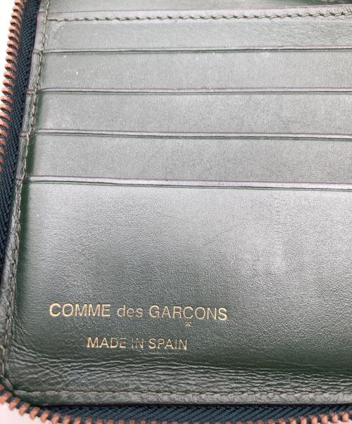 COMME des GARCONS（コムデギャルソン）COMME des GARCONS (コムデギャルソン) ライウンドファスナー2つ折り財布 グリーンの古着・服飾アイテム