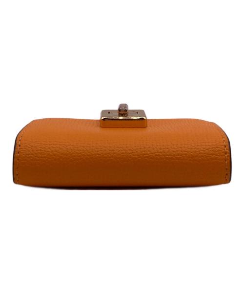 Kate Spade（ケイトスペード）Kate Spade (ケイトスペード) フィービーターンロックミディアムウオレット オレンジの古着・服飾アイテム
