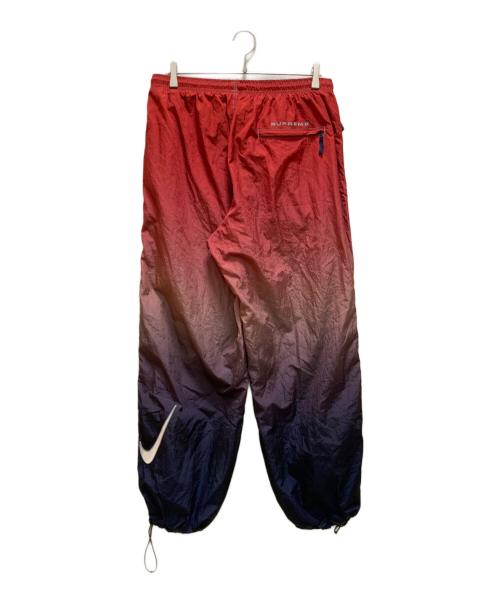 NIKE（ナイキ）NIKE (ナイキ) SUPREME (シュプリーム) コラボ リップストップナイロントラックパンツ レッド サイズ:XLの古着・服飾アイテム