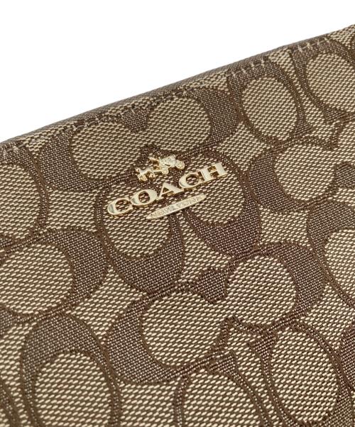 COACH（コーチ）COACH (コーチ) シグネチャークロスボディバッグ ブラウンの古着・服飾アイテム
