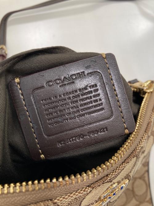 COACH（コーチ）COACH (コーチ) シグネチャークロスボディバッグ ブラウンの古着・服飾アイテム