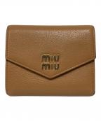 MIU MIUミュウミュウ）の古着「ヴィッテロダイノレザーウォレット」｜ブラウン