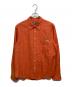 DIESEL（ディーゼル）の古着「ロゴワッペンシャツ」｜オレンジ