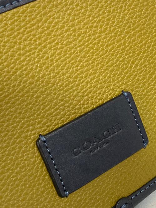 COACH（コーチ）COACH (コーチ) ワイアット ベルト バッグ・カラーブロック ブルー×イエローの古着・服飾アイテム