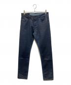 ALEXANDER McQUEENアレキサンダーマックイーン）の古着「コーティングデニムパンツ」｜ネイビー