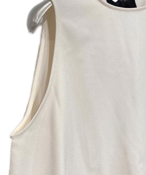 YOIHI（ヨイヒ）YOIHI (ヨイヒ) ノースリーブ フレア フリル リボンカットソー アイボリー サイズ:FREEの古着・服飾アイテム