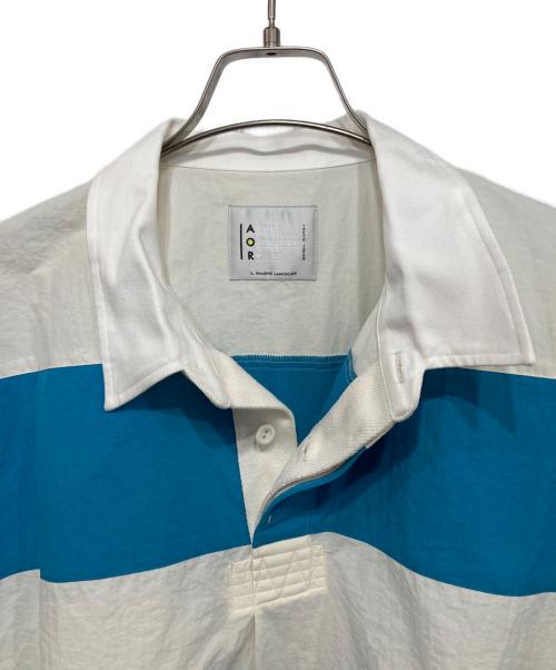 ADULT ORIENTED ROBES（アダルトオリエンテッドローブス）ADULT ORIENTED ROBES (アダルトオリエンテッドローブス) 「Rugby」ナイロンラガーシャツ ブルー サイズ:3の古着・服飾アイテム