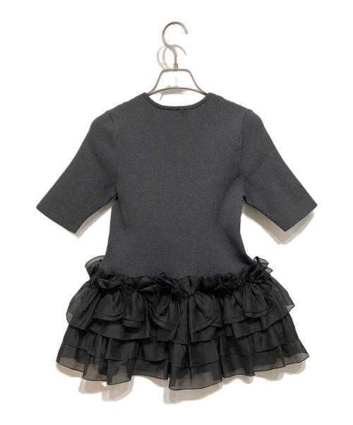 UNITED ARROWS TOKYO（ユナイテッドアローズトウキョウ）UNITED ARROWS TOKYO (ユナイテッドアローズトウキョウ) リボン ペプラム ニット グレー×ブラック サイズ:-の古着・服飾アイテム