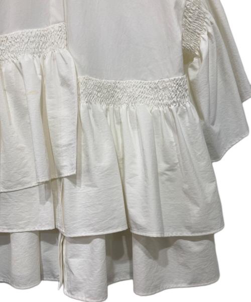 UNITED ARROWS TOKYO（ユナイテッドアローズトウキョウ）UNITED ARROWS TOKYO (ユナイテッドアローズトウキョウ) イレギュラー シャーリング 六分袖 ブラウス ソリッド ホワイト サイズ:36の古着・服飾アイテム