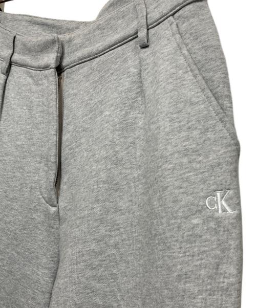 Calvin Klein Jeans（カルバンクラインジーンズ）Calvin Klein Jeans (カルバンクラインジーンズ) スウェットパンツ ライトグレー サイズ:Sの古着・服飾アイテム