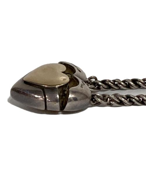 TIFFANY & Co.（ティファニー）TIFFANY & Co. (ティファニー) パズルハートチェーンネックレス シルバー×ゴールドの古着・服飾アイテム