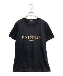 BALMAIN（バルマン）の古着「プリントTシャツ」｜ゴールド×ブラック
