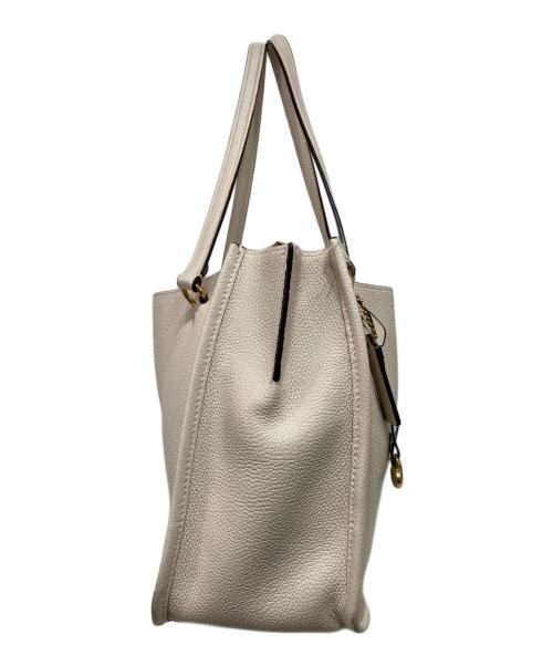 COACH（コーチ）COACH (コーチ) タイラー キャリーオール トートバッグ2way アイボリーの古着・服飾アイテム