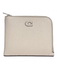 COACH（コーチ）の古着「Lジップ ウォレット・シグネチャー キャンバス」｜ホワイト
