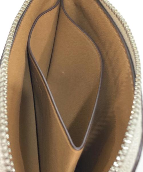 COACH（コーチ）COACH (コーチ) Lジップ ウォレット・シグネチャー キャンバス ホワイトの古着・服飾アイテム