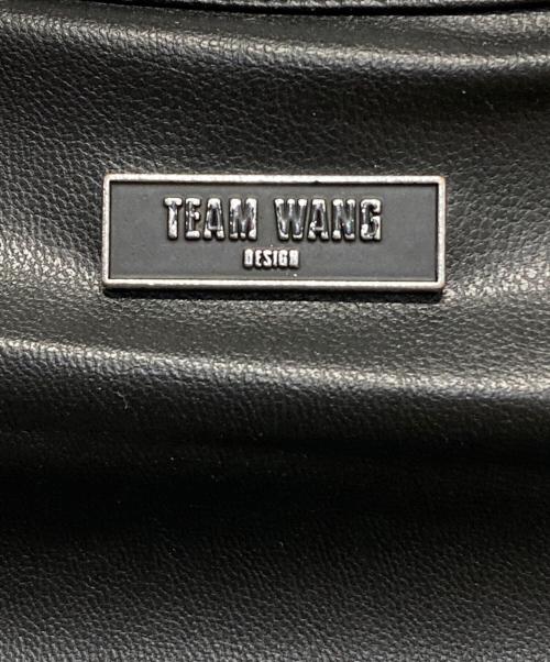 TEAM WANG design（チームワンデザイン）TEAM WANG design (チームワンデザイン) カットオフエッジシャツ ブラックの古着・服飾アイテム
