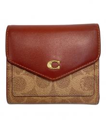 COACH（コーチ）の古着「シグネチャーウォレット」｜ブラウン