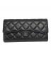 CHANEL（シャネル）の古着「キャビアスキンフラップウォレット」｜ブラック
