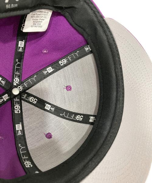 New Era（ニューエラ）New Era (ニューエラ) stussy (ステューシー) Buy Stussy World Tour-キャップ パープル サイズ:7 1/8の古着・服飾アイテム