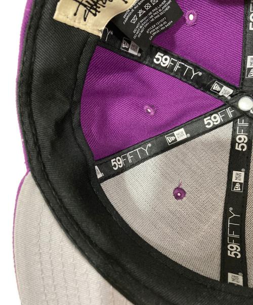 New Era（ニューエラ）New Era (ニューエラ) stussy (ステューシー) Buy Stussy World Tour-キャップ パープル サイズ:7 1/8の古着・服飾アイテム
