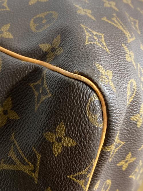 LOUIS VUITTON（ルイ ヴィトン）LOUIS VUITTON (ルイ ヴィトン) トラベルバッグ ブラウンの古着・服飾アイテム