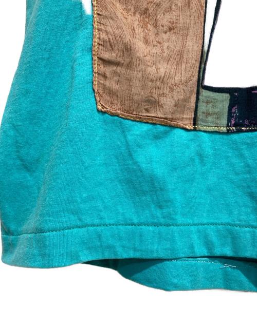 Hanes（ヘインズ）Hanes (ヘインズ) 黄色い背景の女 アートTシャツ ブルー サイズ:XLの古着・服飾アイテム