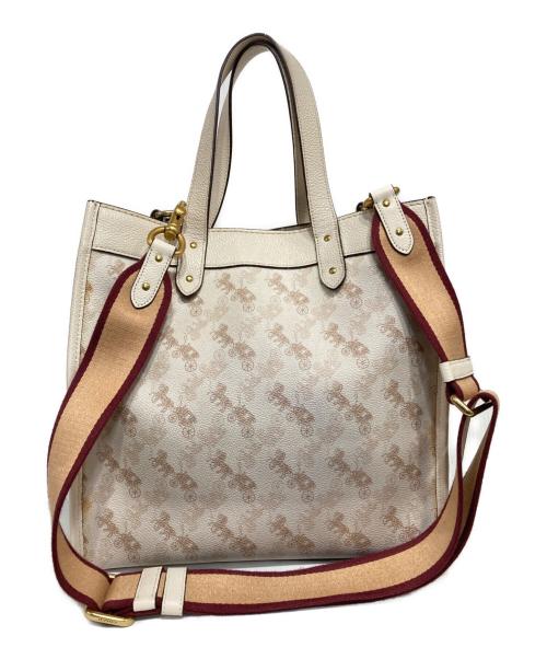 COACH（コーチ）COACH (コーチ) ホース＆キャリッジ コーティングキャンバス レザーバッグ ベージュ×アイボリーの古着・服飾アイテム